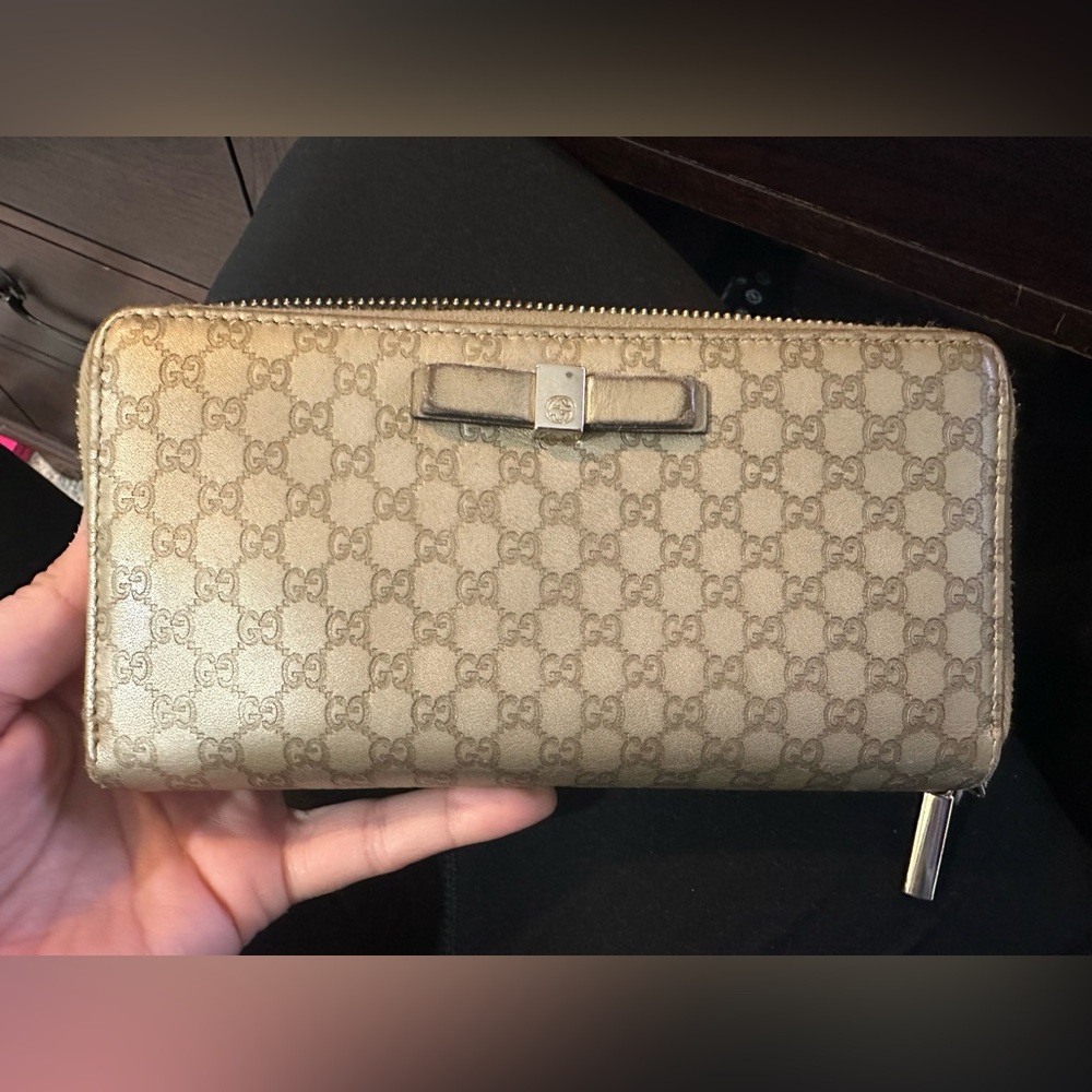 Gucci Metallic Gold GG Logo Zip Wallet with Bow Accent